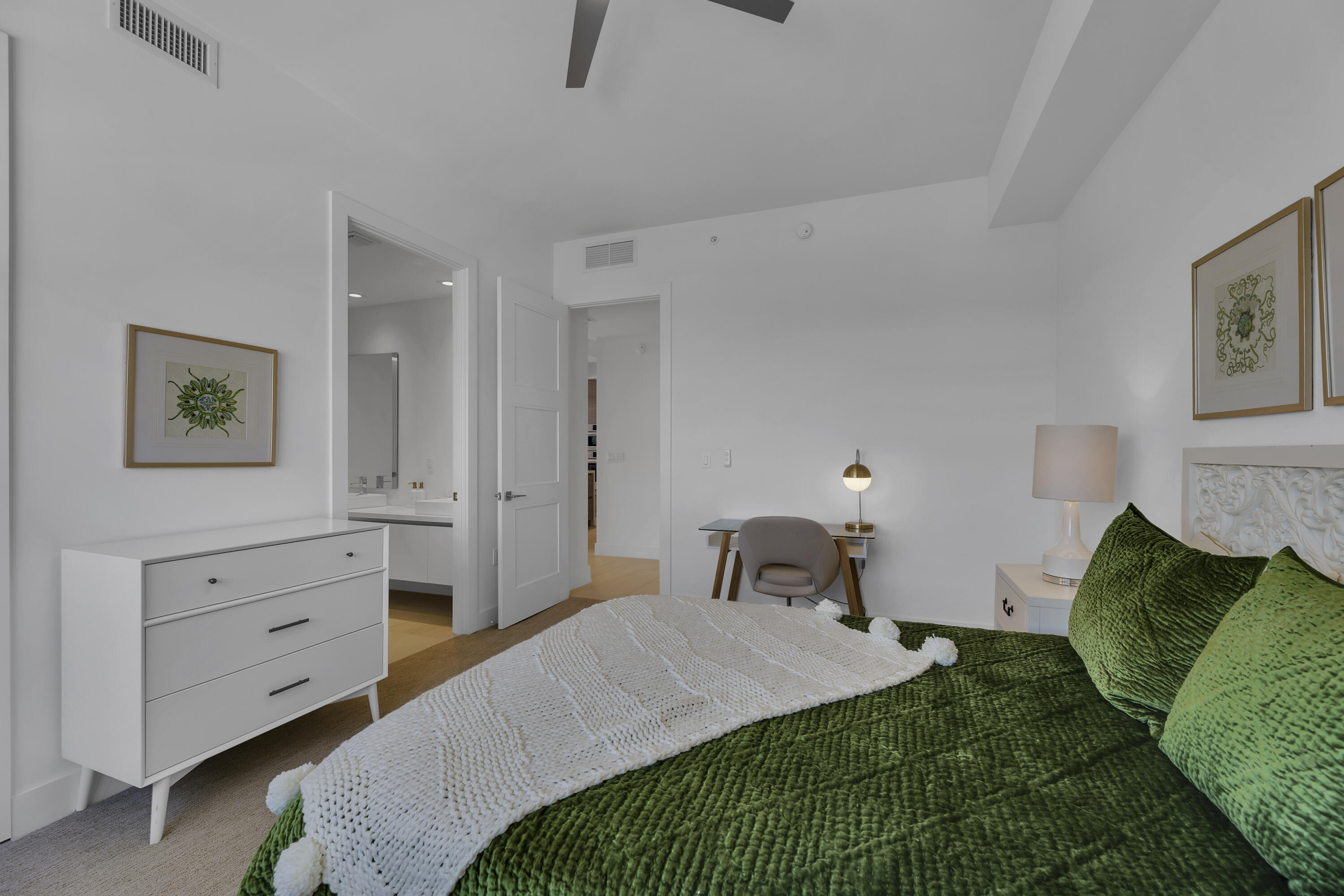 155 East Boca Raton Road, Unit 607 Boca Raton, FL 33432 - Photo 9 of 15 a bedroom with a bed and a table