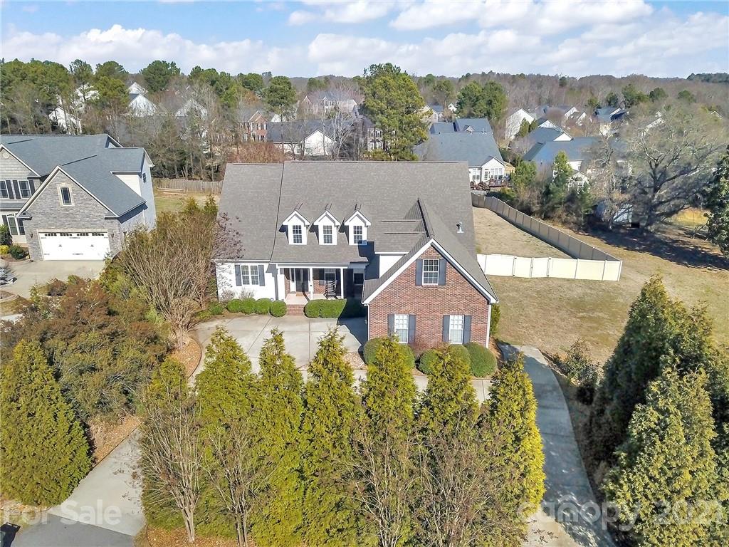 1804 Sam Smith Road Fort Mill, SC 29708 - Photo 3 of 48 an aerial view of a house with a garden