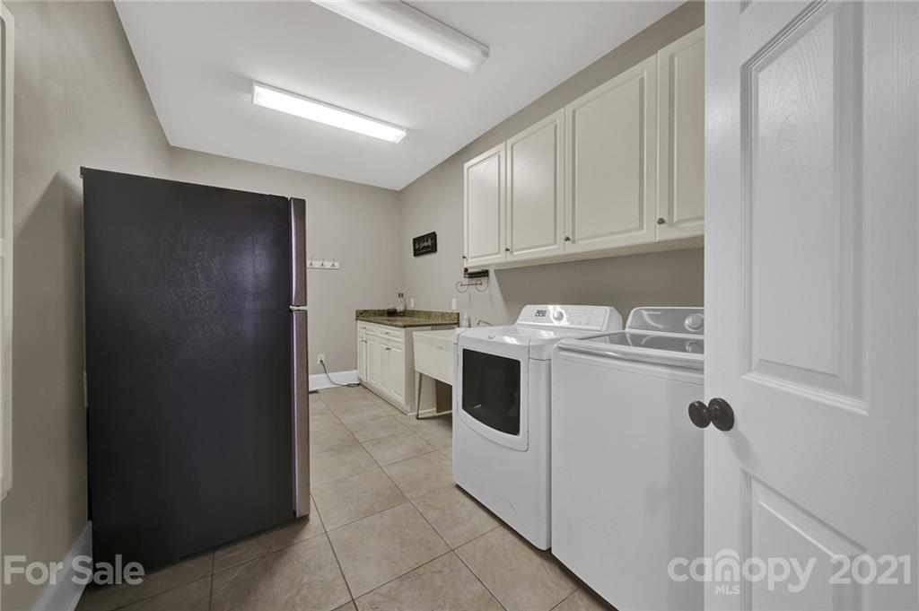 1804 Sam Smith Road Fort Mill, SC 29708 - Photo 22 of 48 a utility room with dryer and washer