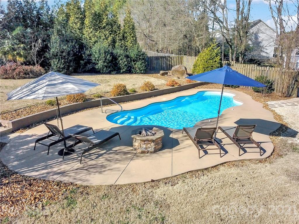1804 Sam Smith Road Fort Mill, SC 29708 - Photo 46 of 48 a view of a swimming pool with lounge chairs