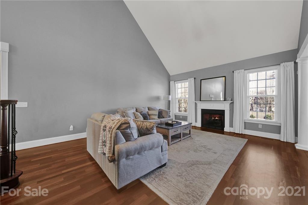 1804 Sam Smith Road Fort Mill, SC 29708 - Photo 10 of 48 a living room with furniture and a fireplace