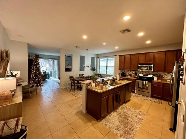 a large kitchen with lots of appliances and cabinets