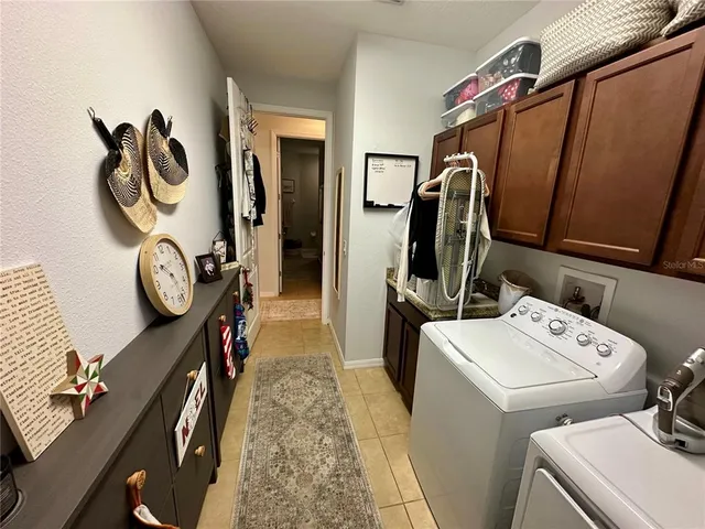 a view of bathroom with a tub and a view of bathroom