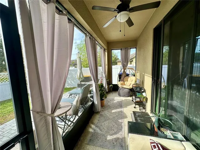 a very nice looking room with large windows