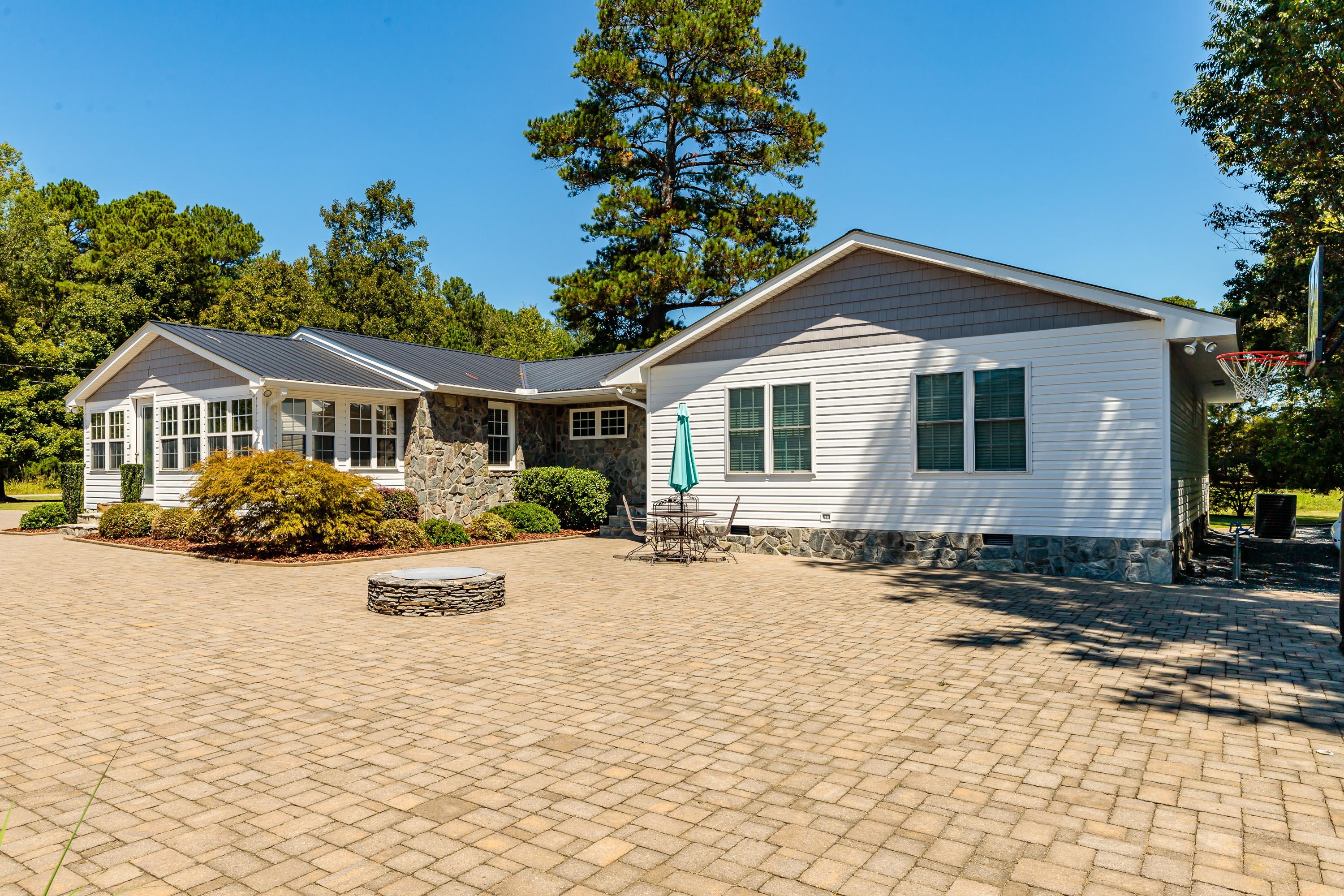 2777 Farm Life School Road Carthage, NC 28327 - Photo 4 of 44 Great outdoor living space with fire pit & patio area