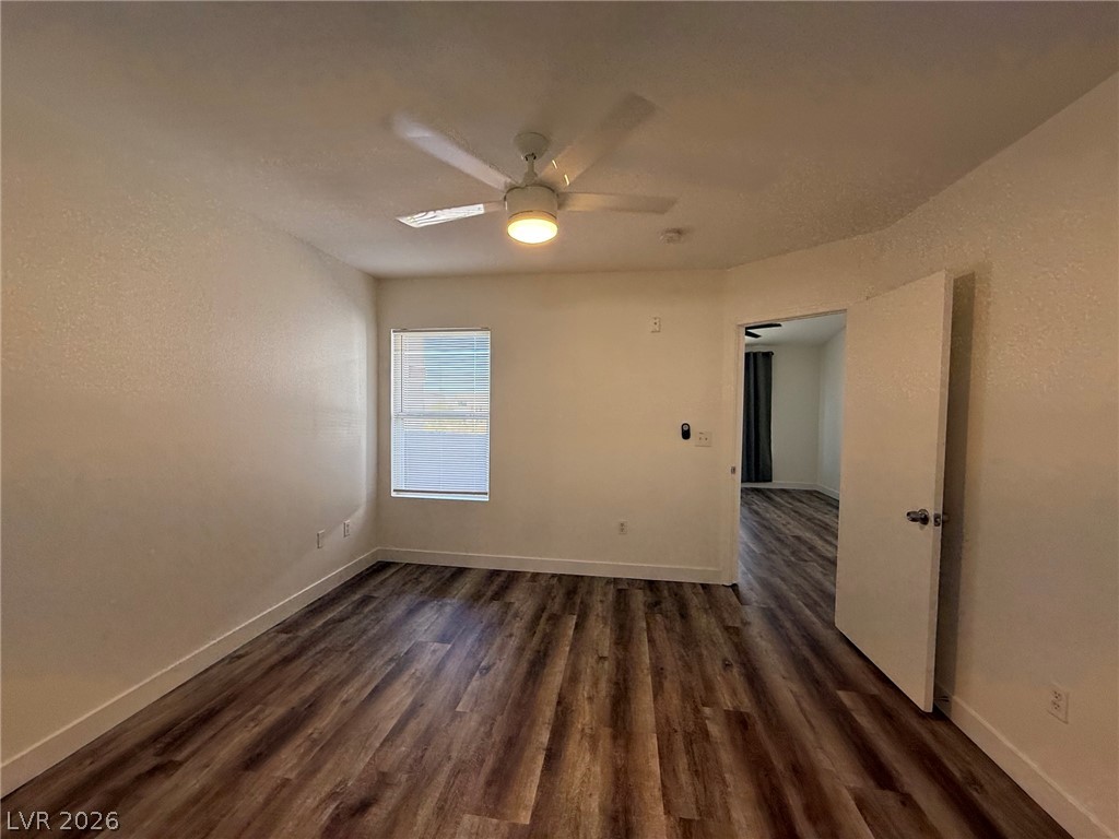 7255 West Sunset Road, Unit 2149 Las Vegas, NV 89113 - Photo 17 of 28 Bright and airy, this room features durable wood-look flooring and a ceiling fan for comfort.