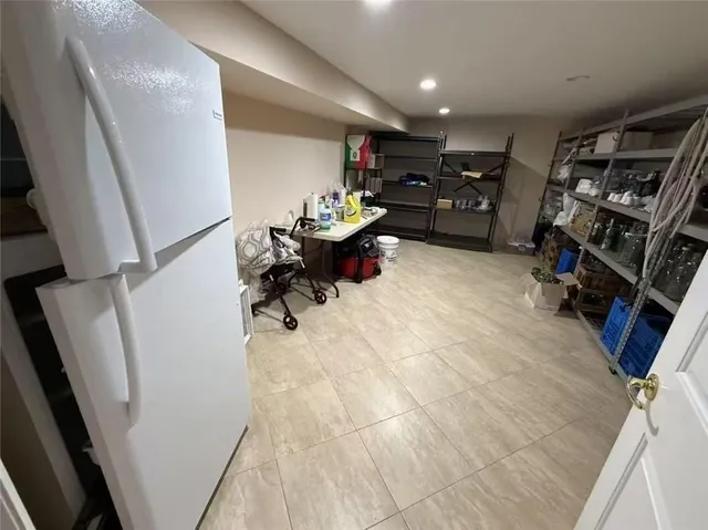 a room with furniture and a flat screen tv