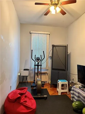 a room with furniture and a flat screen tv