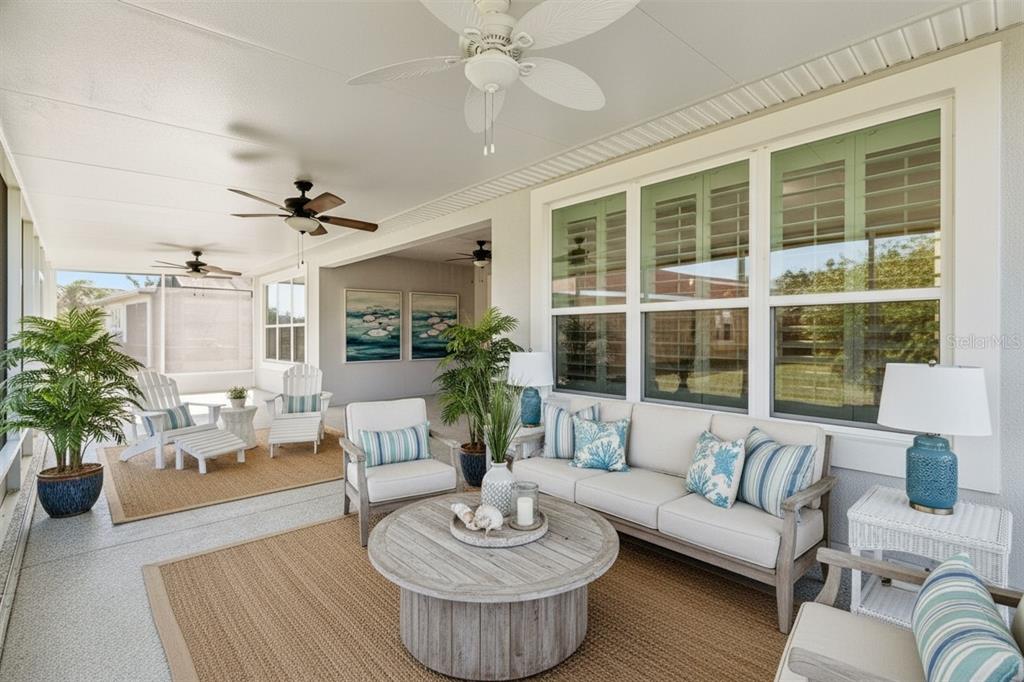 711 San Joaquin Road Kissimmee, FL 34759 - Photo 21 of 41 a living room with furniture and a large window