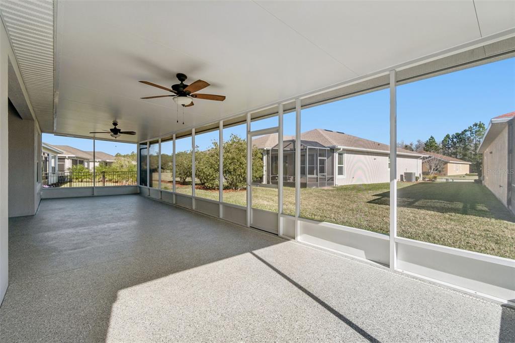 711 San Joaquin Road Kissimmee, FL 34759 - Photo 41 of 41 a view of a porch and floor to ceiling window