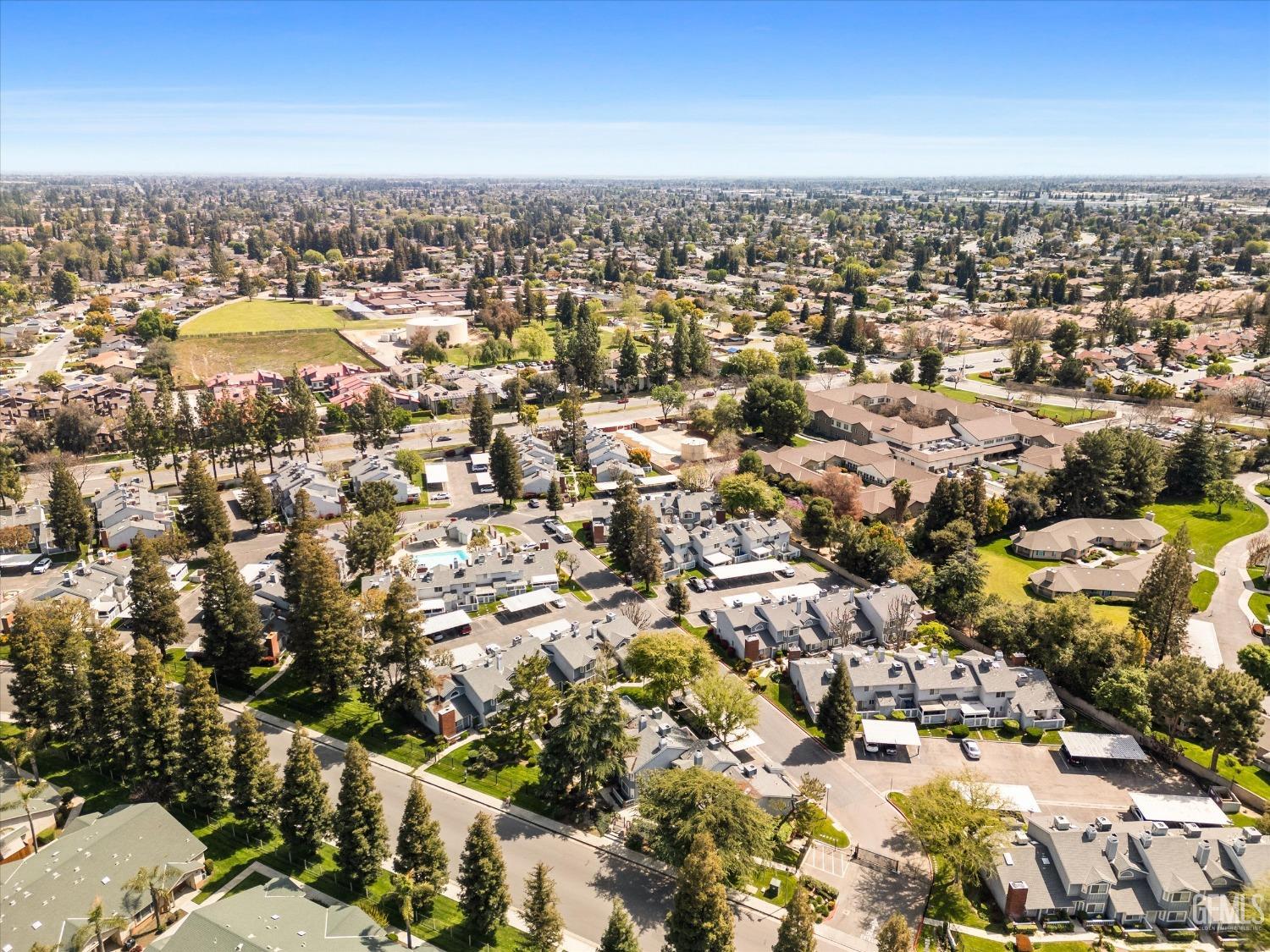 Undisclosed Address Bakersfield, CA 93311 - Photo 29 of 33 an aerial view of residential building with parking space