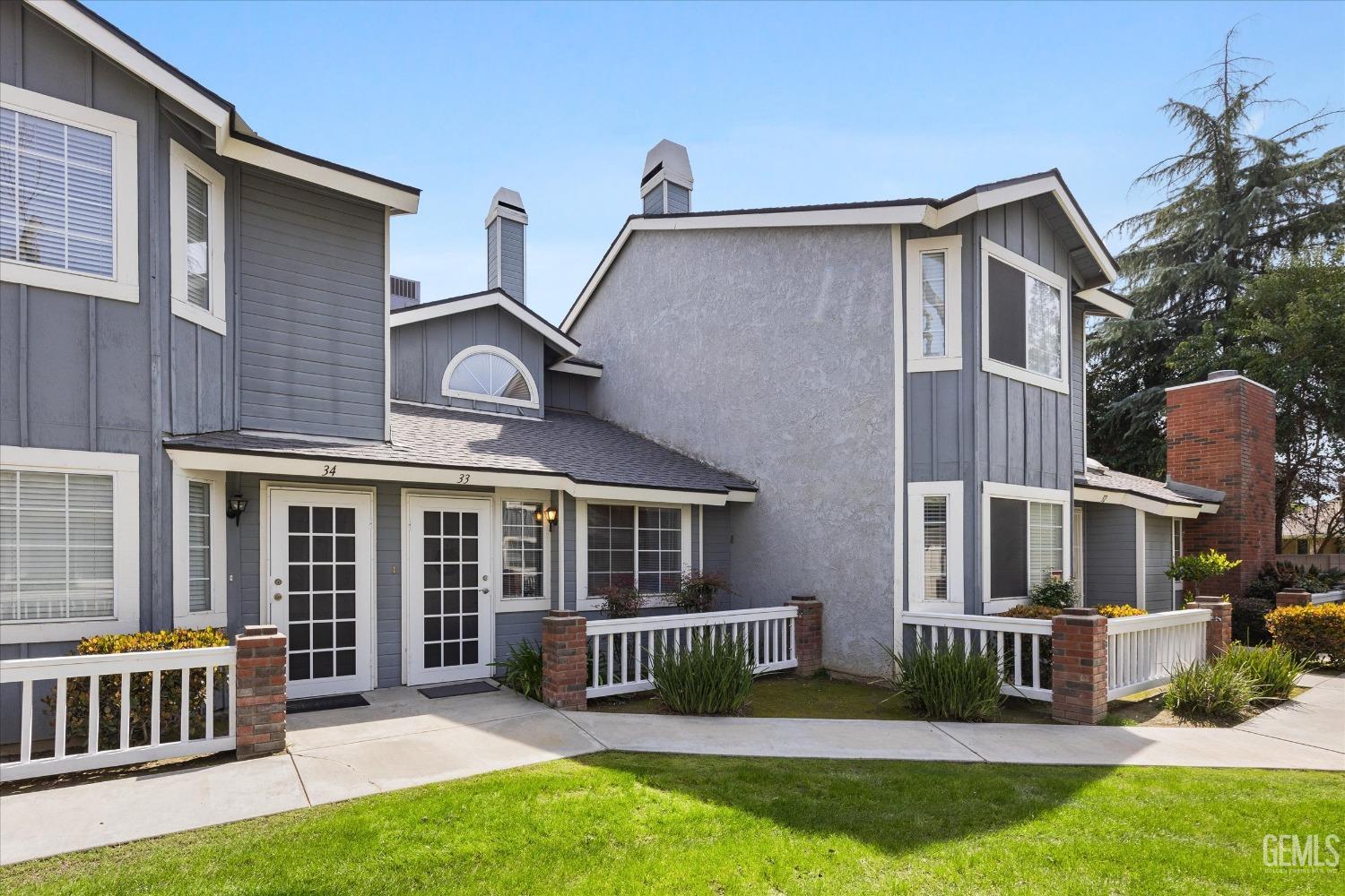 Undisclosed Address Bakersfield, CA 93311 - Photo 3 of 33 front view of a house with a yard