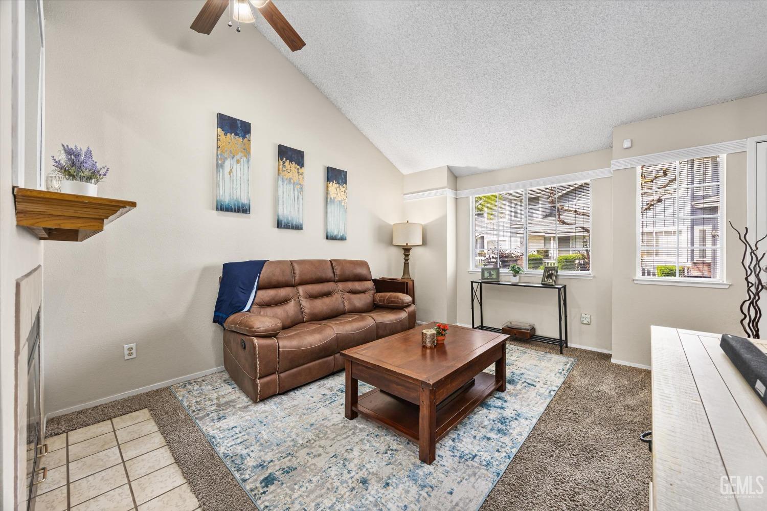 Undisclosed Address Bakersfield, CA 93311 - Photo 6 of 33 a living room with furniture a rug and a window