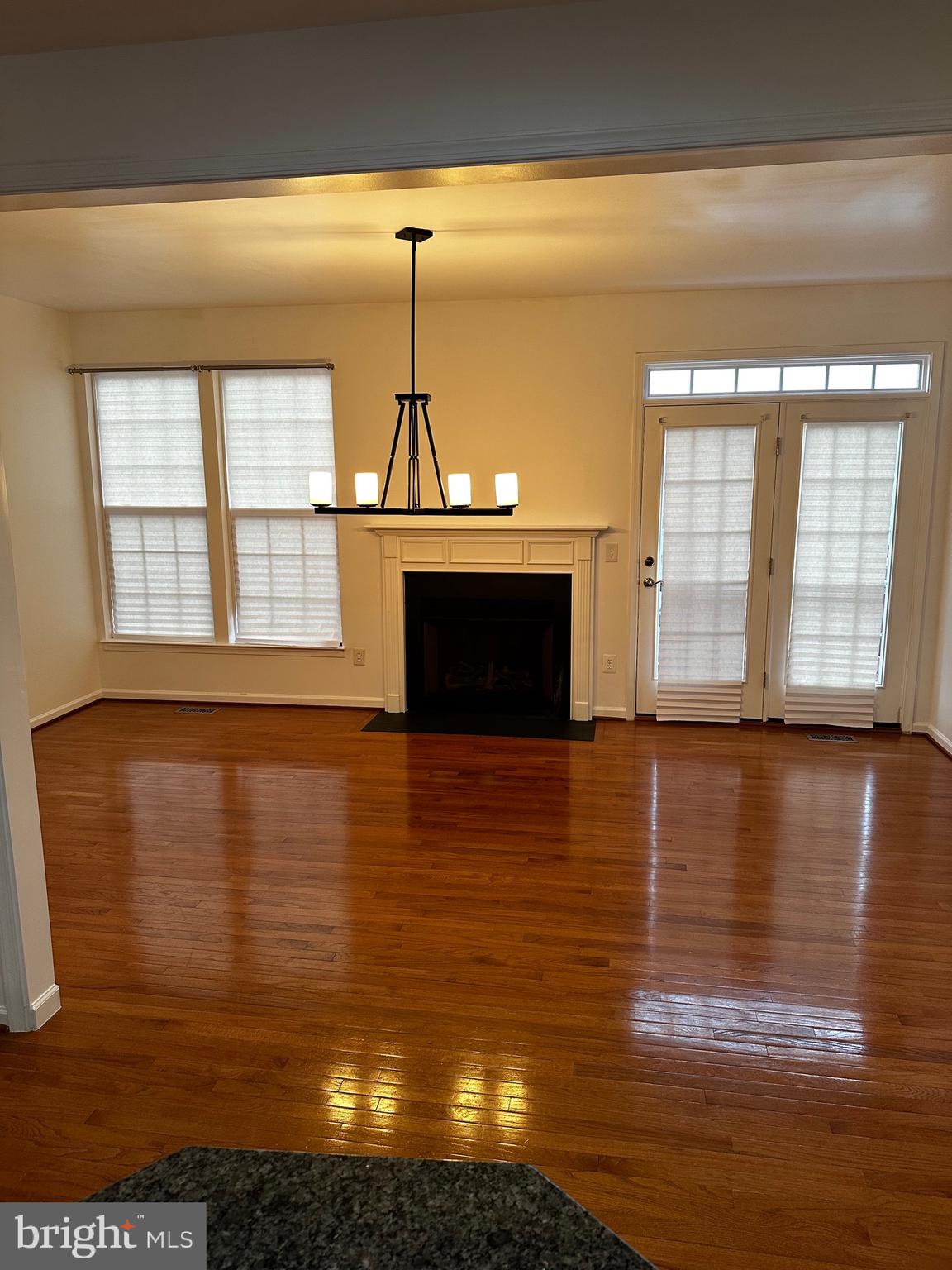 64 Monte Carlo Way Charles Town, WV 25414 - Photo 1 of 34 a view of an empty room with wooden floor and a window