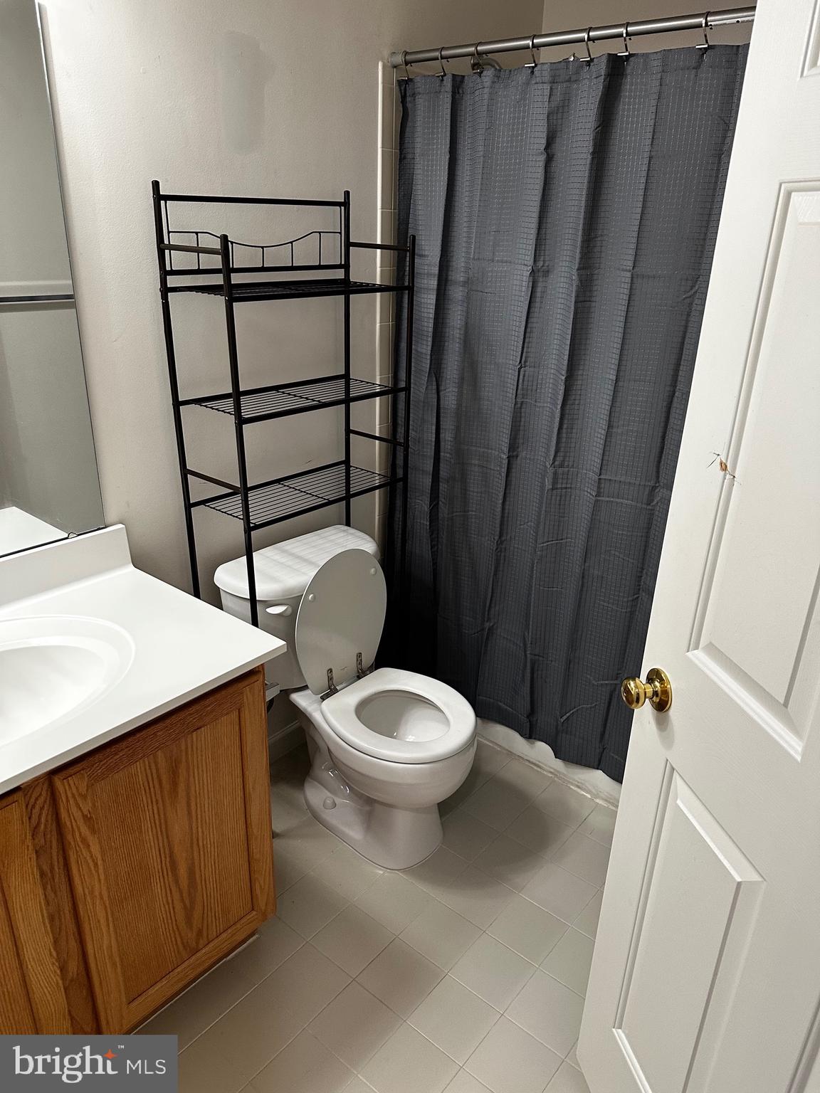 64 Monte Carlo Way Charles Town, WV 25414 - Photo 11 of 34 a white toilet sitting next to a sink