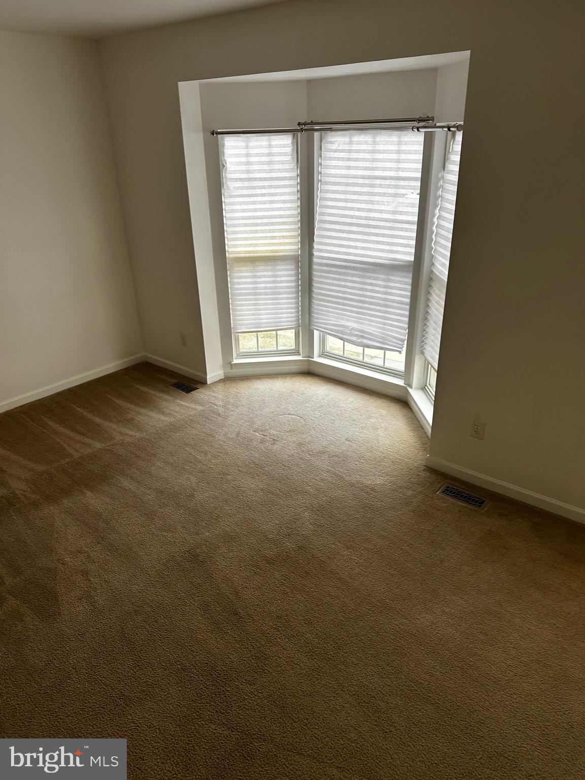 64 Monte Carlo Way Charles Town, WV 25414 - Photo 14 of 34 an empty room with a window