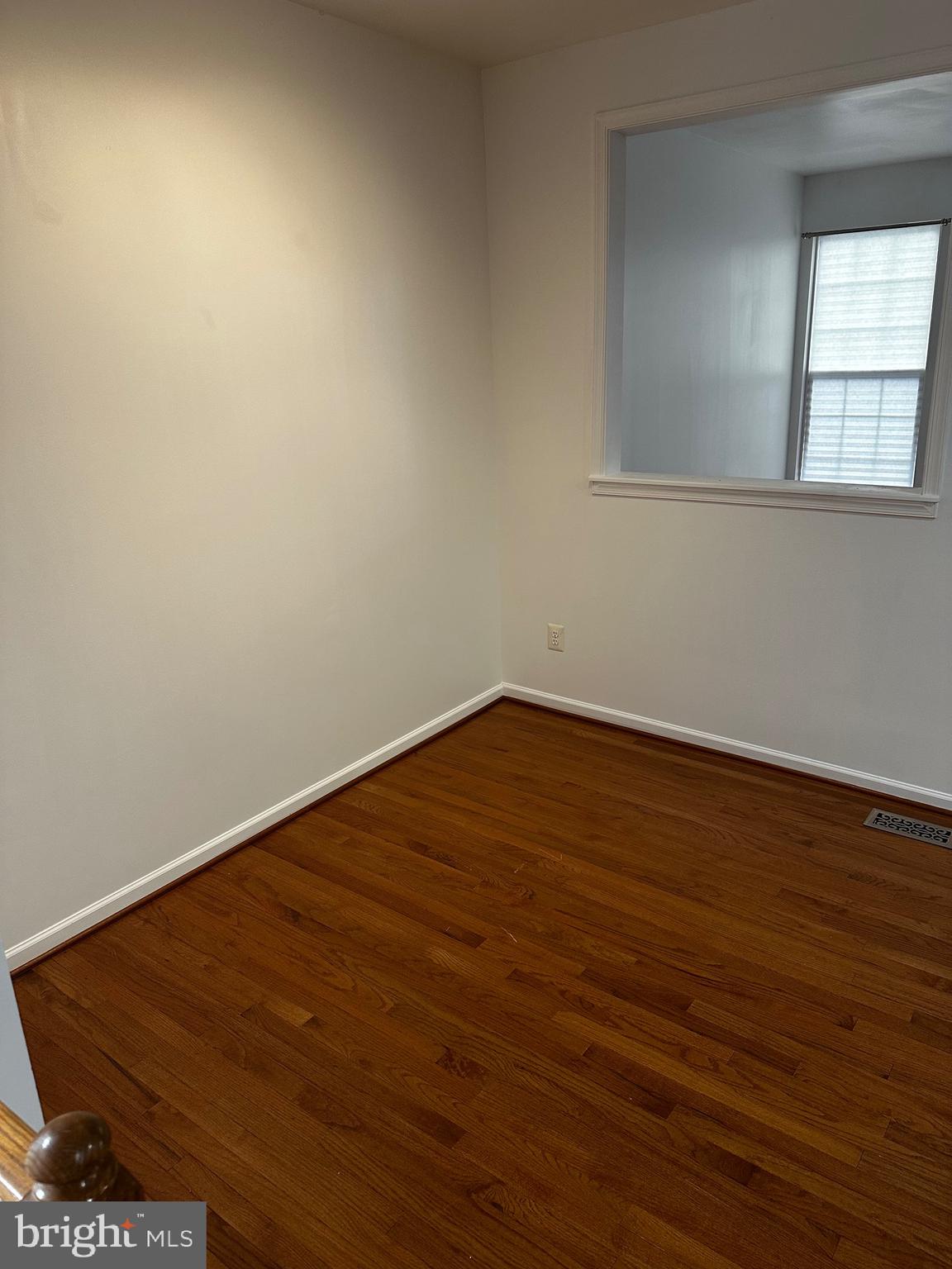 64 Monte Carlo Way Charles Town, WV 25414 - Photo 17 of 34 an empty room with wooden floor and windows