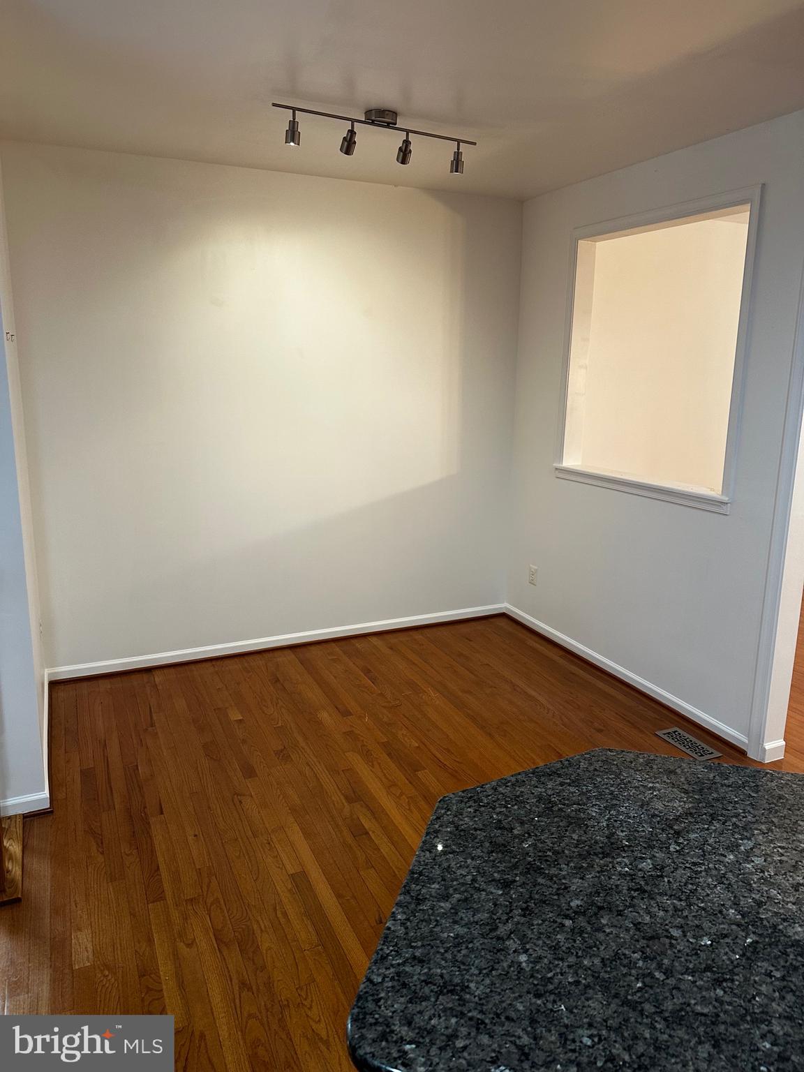 64 Monte Carlo Way Charles Town, WV 25414 - Photo 23 of 34 a view of empty room with wooden floor and fan