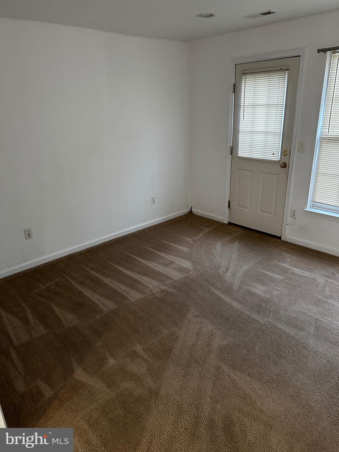 64 Monte Carlo Way Charles Town, WV 25414 - Photo 33 of 34 an empty room with windows
