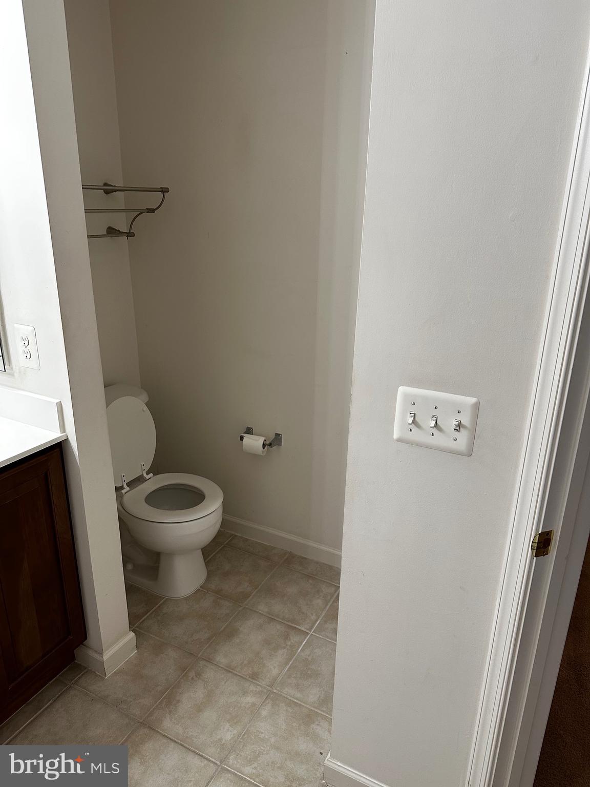 64 Monte Carlo Way Charles Town, WV 25414 - Photo 5 of 34 a white toilet sitting next to a sink