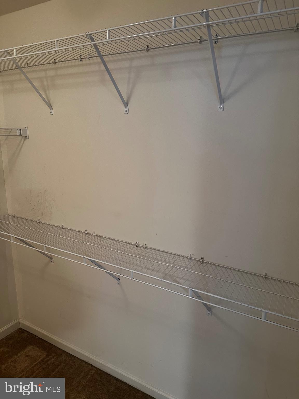 64 Monte Carlo Way Charles Town, WV 25414 - Photo 9 of 34 a view of a room with racks on the wall