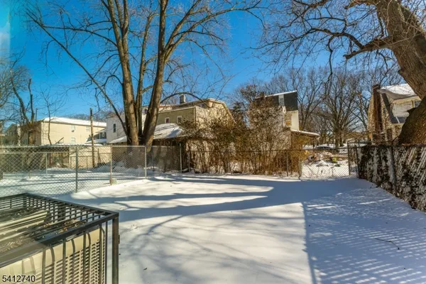 a view of street along with trees