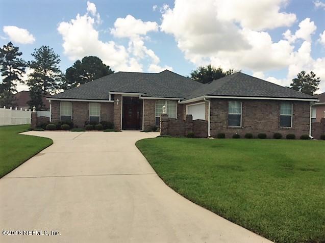 1115 Copper Field Circle Macclenny, FL 32063 - Photo 1 of 40 a front view of house with yard and green space