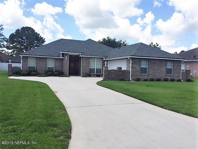1115 Copper Field Circle Macclenny, FL 32063 - Photo 2 of 40 a front view of house with yard and green space