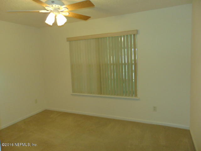 1115 Copper Field Circle Macclenny, FL 32063 - Photo 29 of 40 an empty room with a window