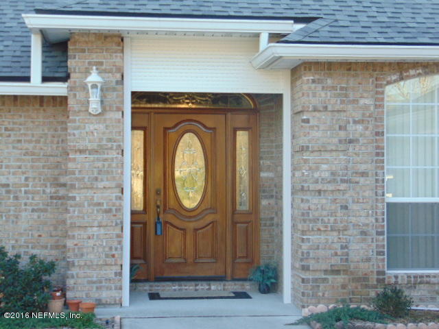 1115 Copper Field Circle Macclenny, FL 32063 - Photo 37 of 40 a bathroom with a sink and a toilet