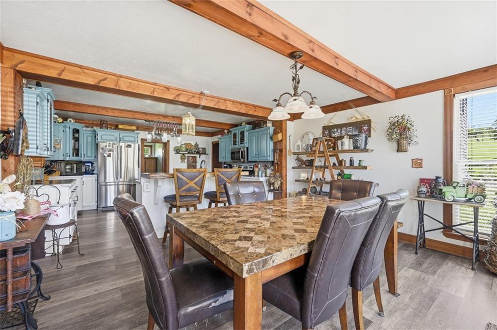 2976 Henderson Road Washington, PA 15301 - Photo 9 of 50 a dining room with a wooden table and chairs