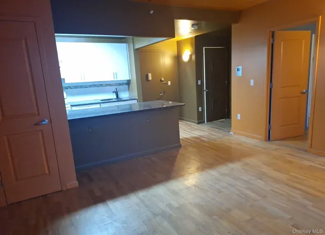 a view of kitchen and a sink