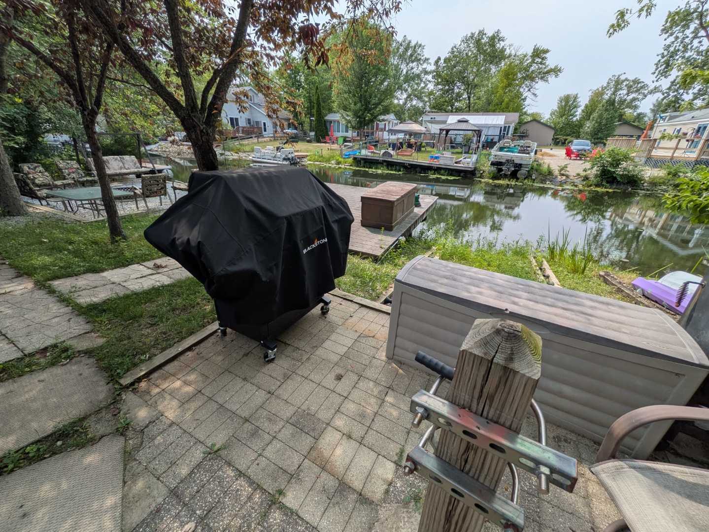 96 Fossil Ridge Road Wilmington, IL 60481 - Photo 11 of 22 a view of a lake with chairs