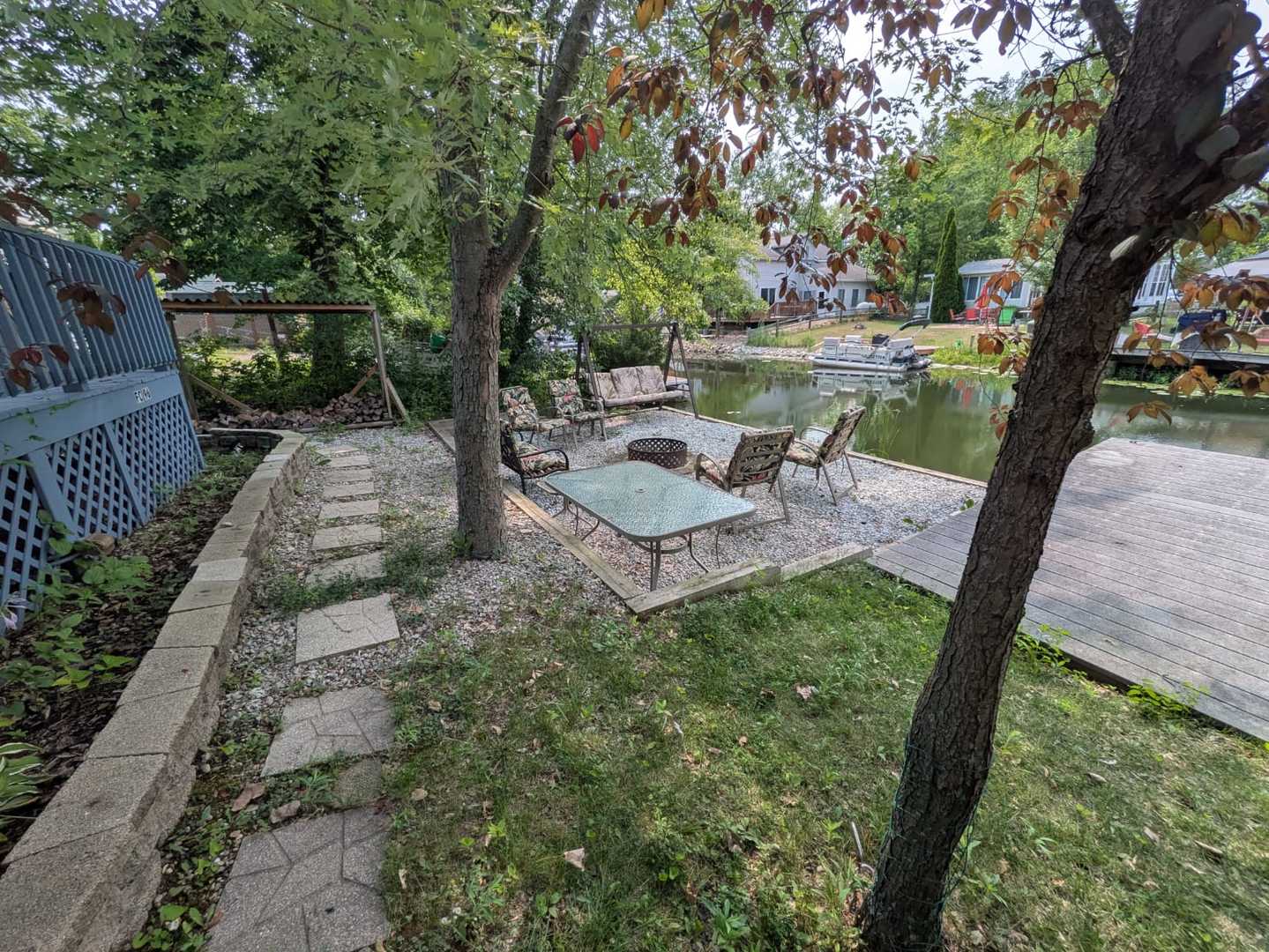 96 Fossil Ridge Road Wilmington, IL 60481 - Photo 14 of 22 a view of a garden with sitting area