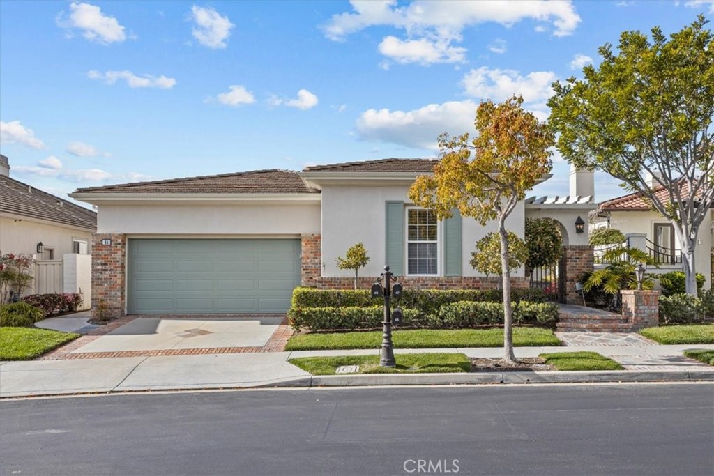 45 Camino Lienzo San Clemente, CA 92673 - Photo 3 of 3 a view of a house with a small yard and palm trees