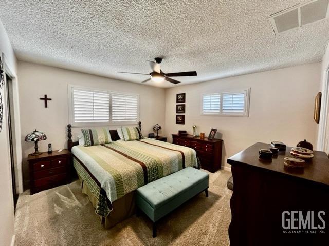 Undisclosed Address Bakersfield, CA 93306 - Photo 17 of 25 a bed room with a bed and a television
