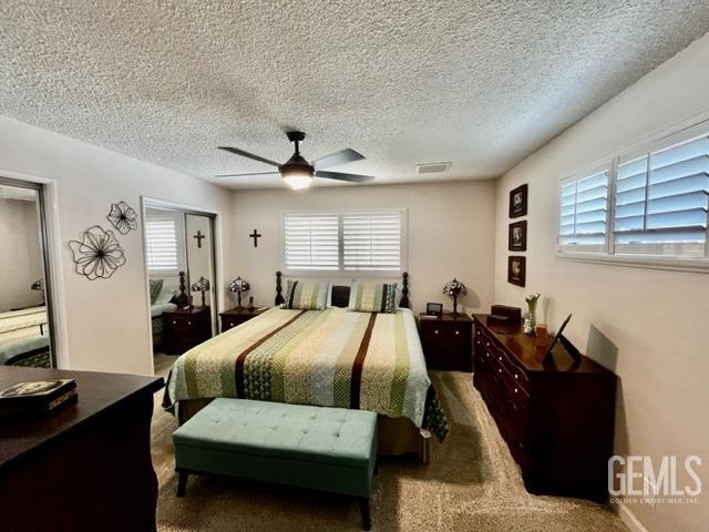 Undisclosed Address Bakersfield, CA 93306 - Photo 18 of 25 a bed room with a bed window and a desk