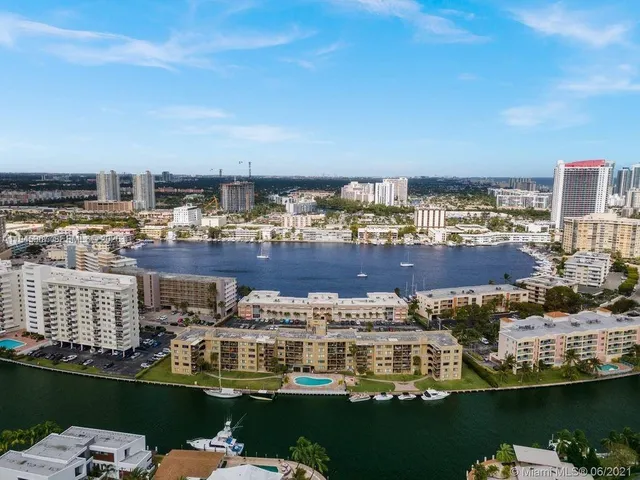a view of swimming pool with outdoor seating and yard