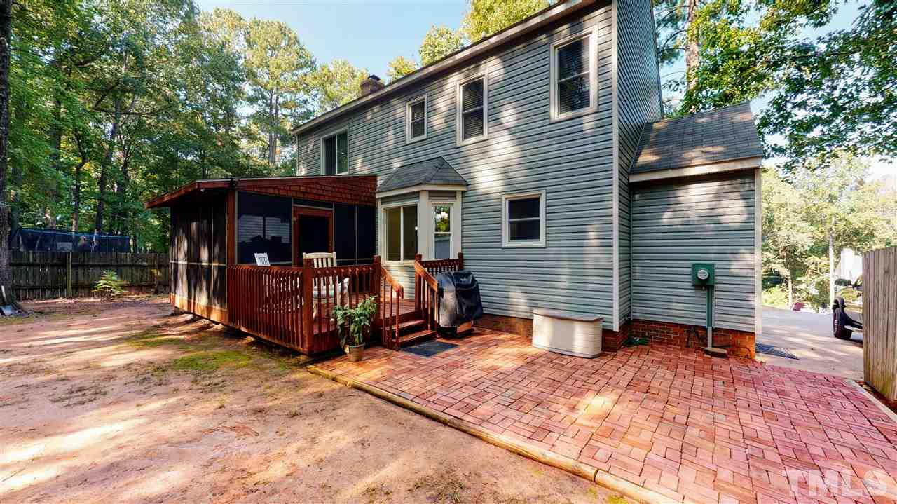 123 Abercrombie Road Wake Forest, NC 27587 - Photo 3 of 27 a view of a house with a yard and chairs