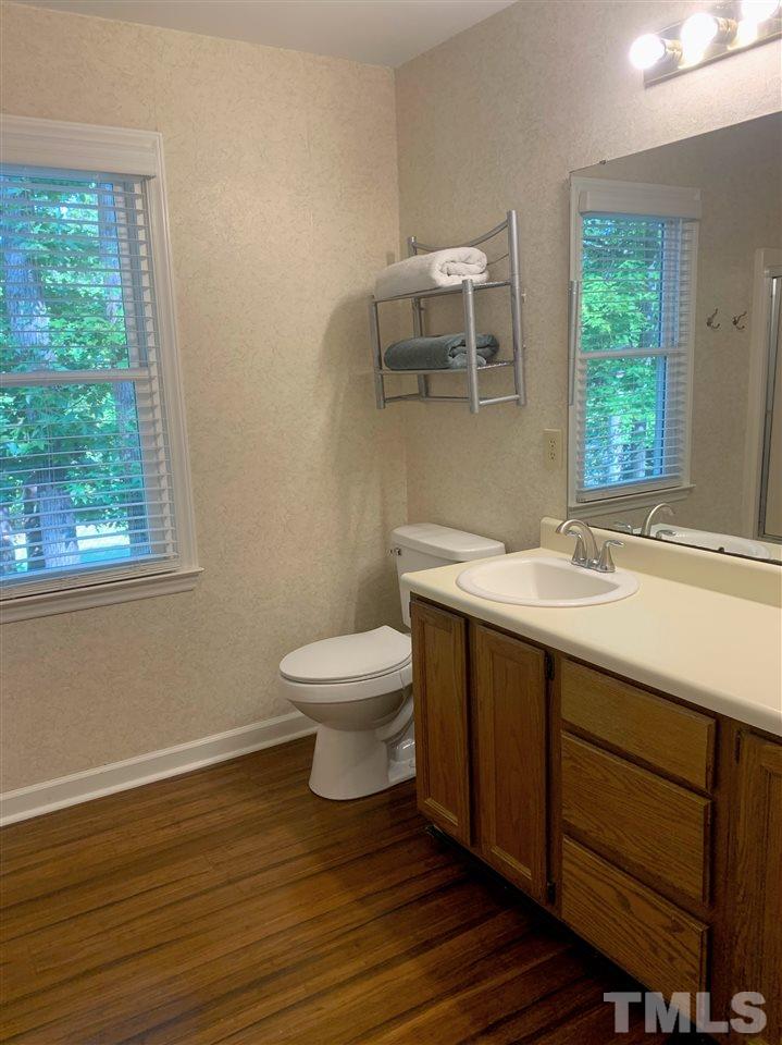 123 Abercrombie Road Wake Forest, NC 27587 - Photo 26 of 27 a bathroom with a sink and a toilet