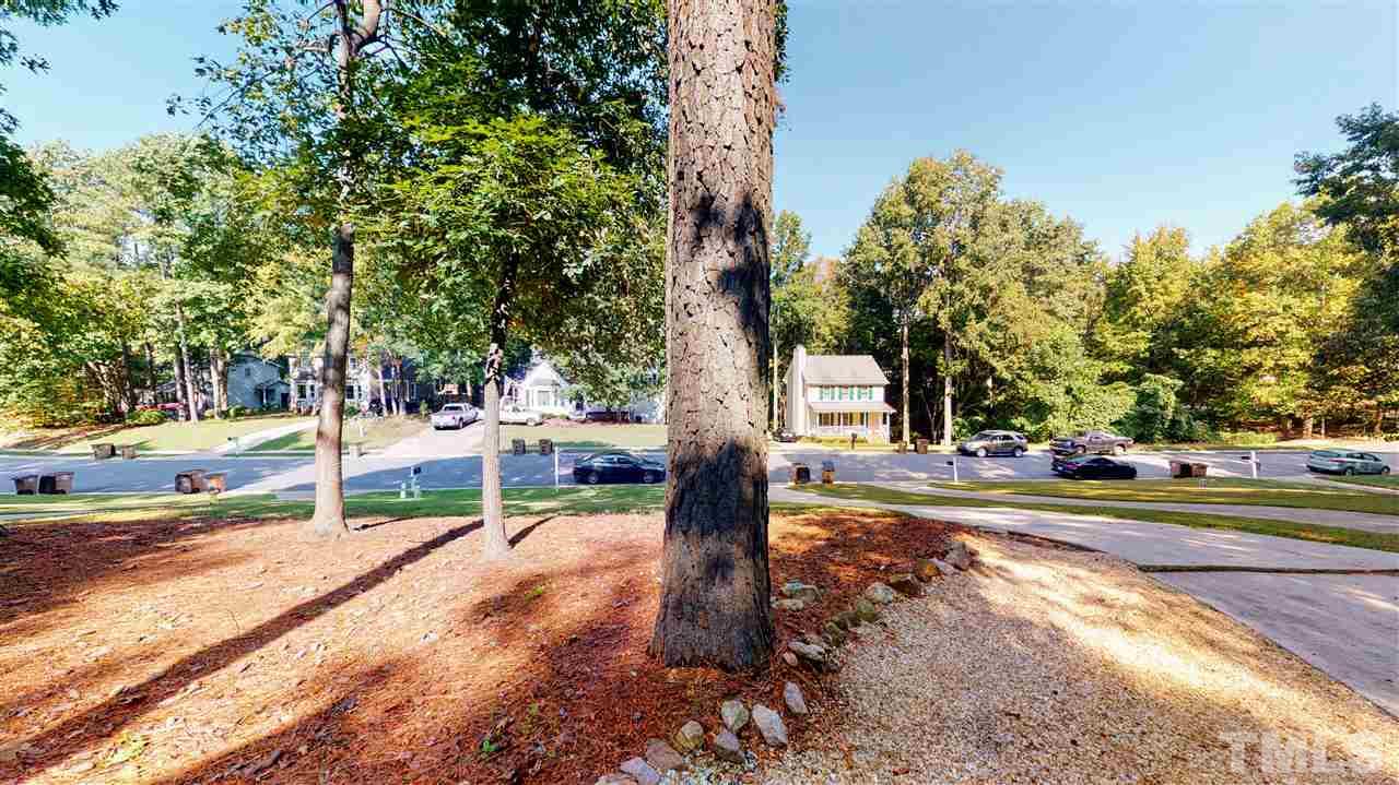 123 Abercrombie Road Wake Forest, NC 27587 - Photo 6 of 27 a view of a park with large trees