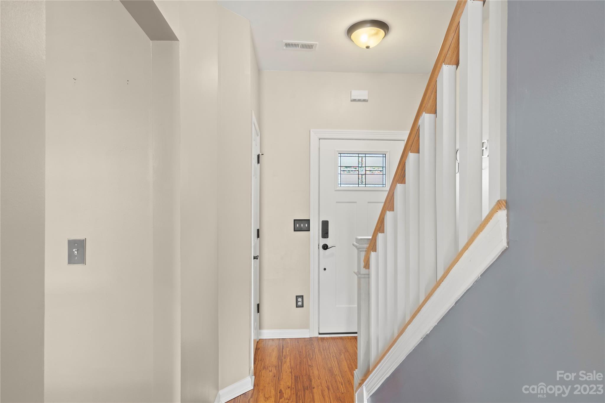 1103 Sienna Sand Way Fort Mill, SC 29708 - Photo 11 of 26 a view of a hallway with staircase