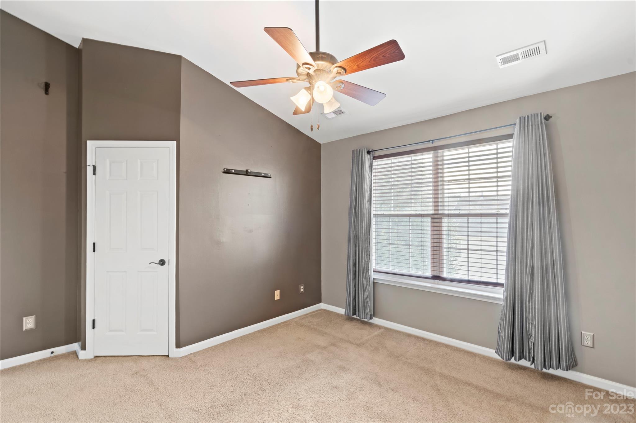 1103 Sienna Sand Way Fort Mill, SC 29708 - Photo 13 of 26 a view of an empty room with a window