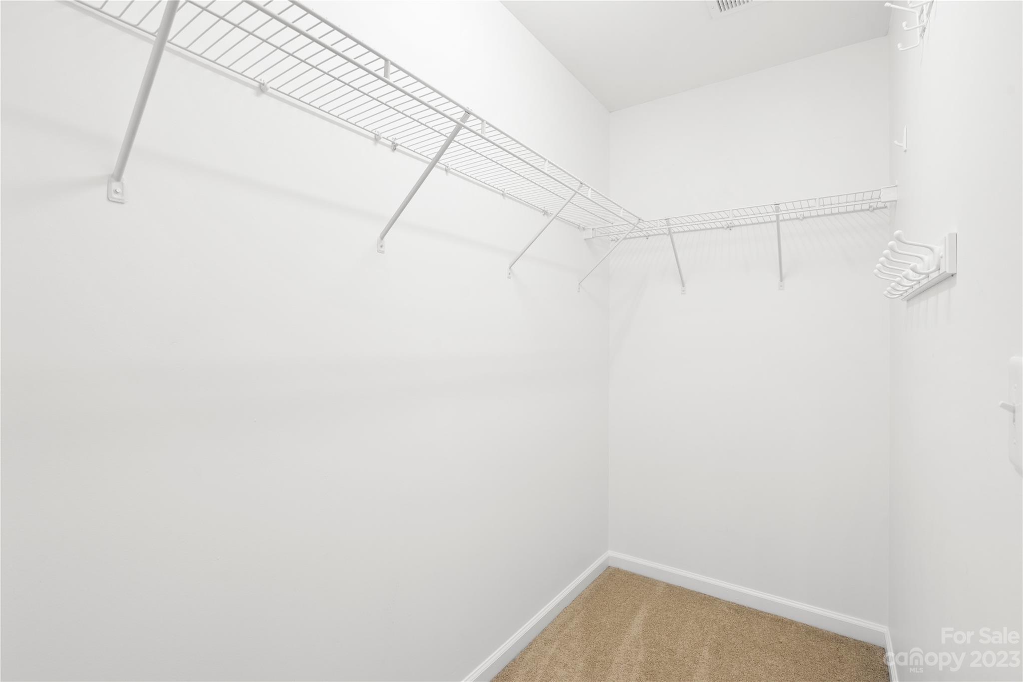 1103 Sienna Sand Way Fort Mill, SC 29708 - Photo 16 of 26 a view of a room with racks on the wall