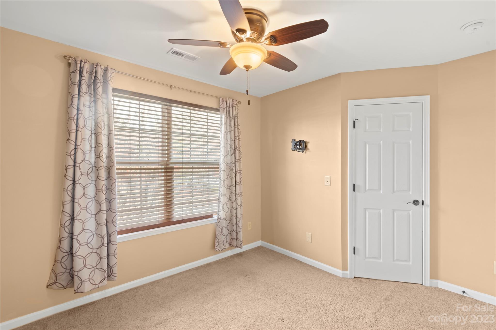 1103 Sienna Sand Way Fort Mill, SC 29708 - Photo 17 of 26 a view of an empty room with a window