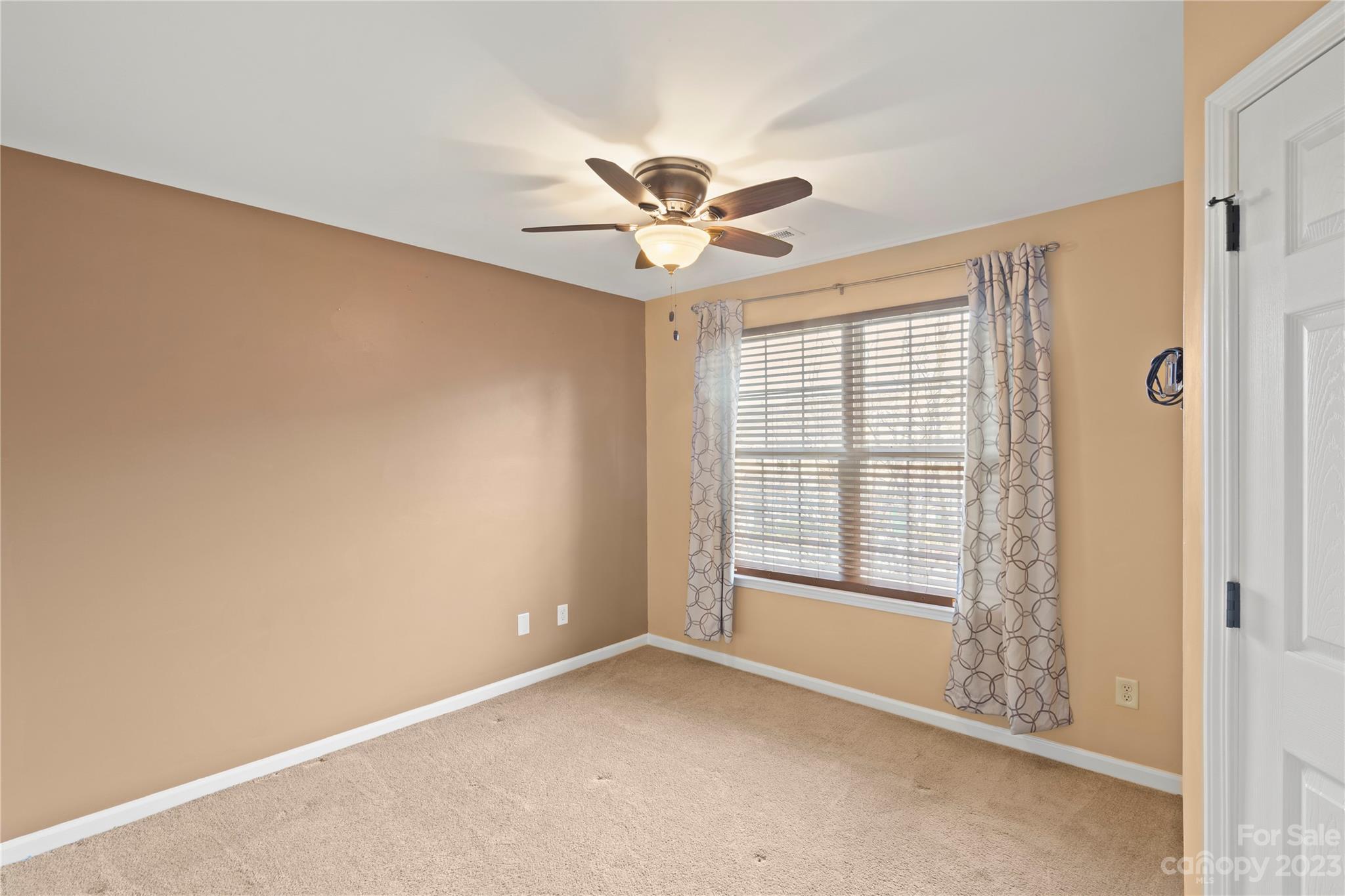 1103 Sienna Sand Way Fort Mill, SC 29708 - Photo 18 of 26 a view of an empty room with a window