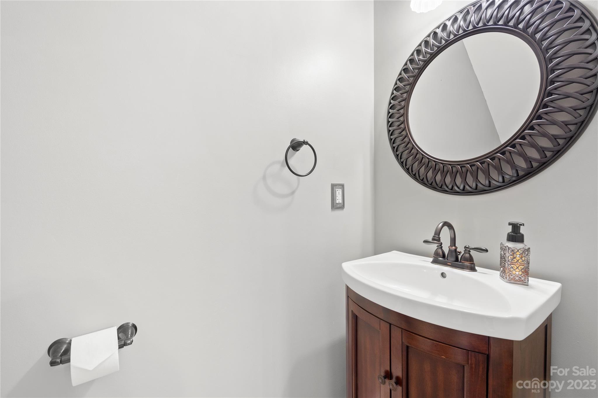1103 Sienna Sand Way Fort Mill, SC 29708 - Photo 20 of 26 a bathroom with a sink and a mirror
