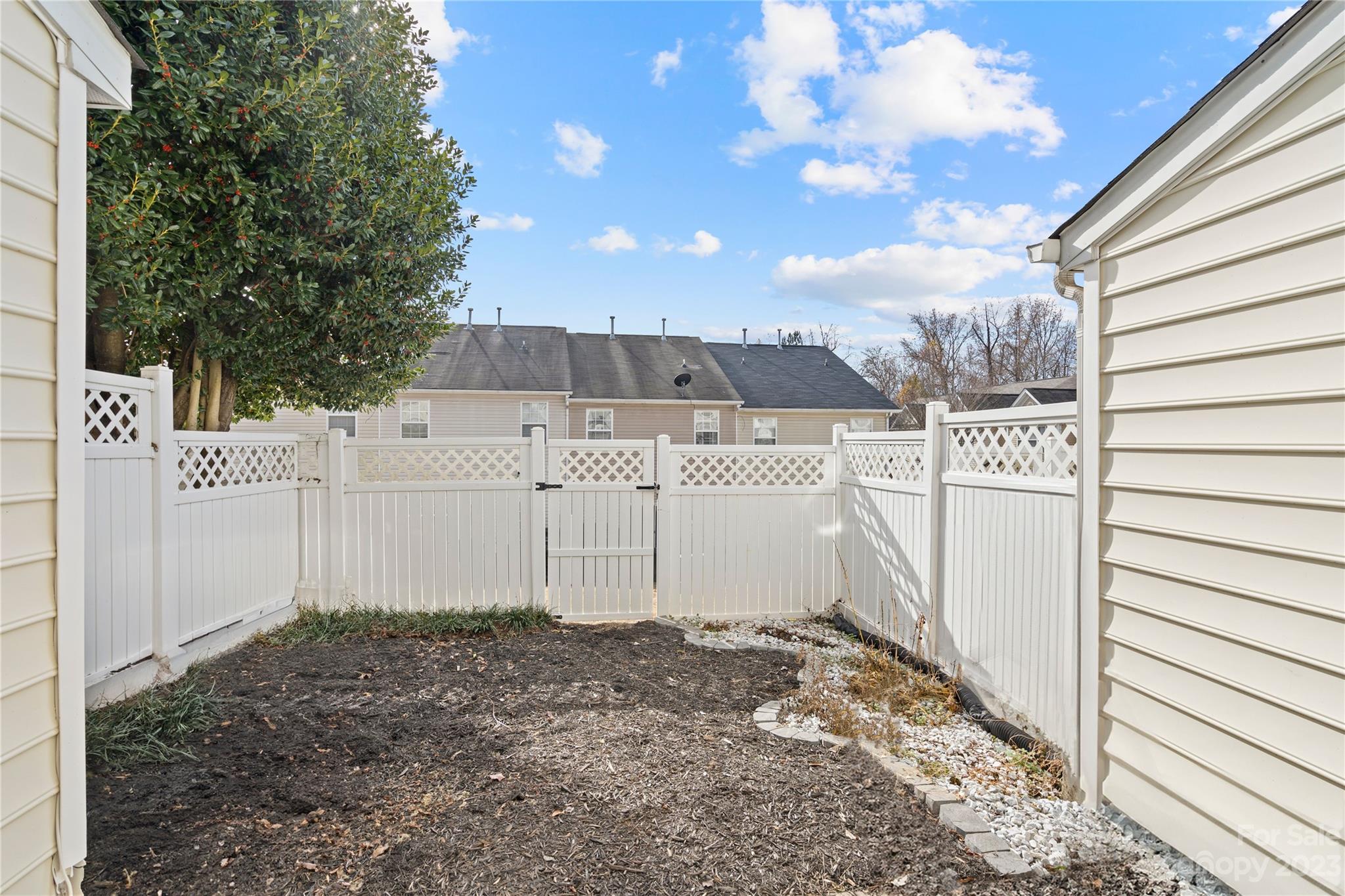 1103 Sienna Sand Way Fort Mill, SC 29708 - Photo 23 of 26 a view of a backyard