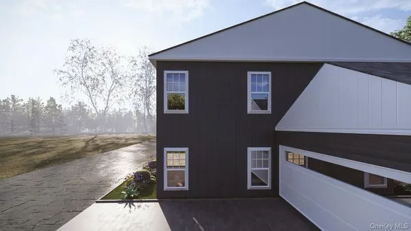 a front view of a house with trees