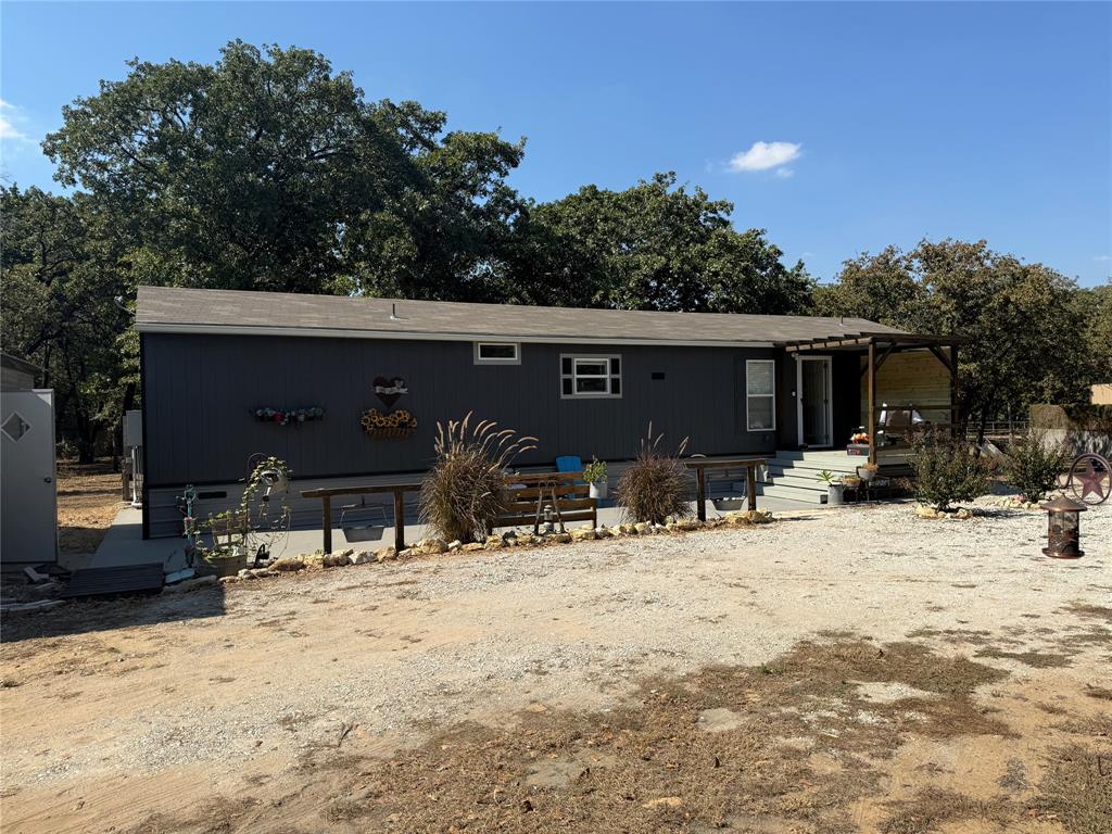 Manufactured / mobile home featuring a patio